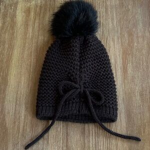 Women’s Black Juicy Couture Knit Beanie with Faux Fur Pom and Back Tie